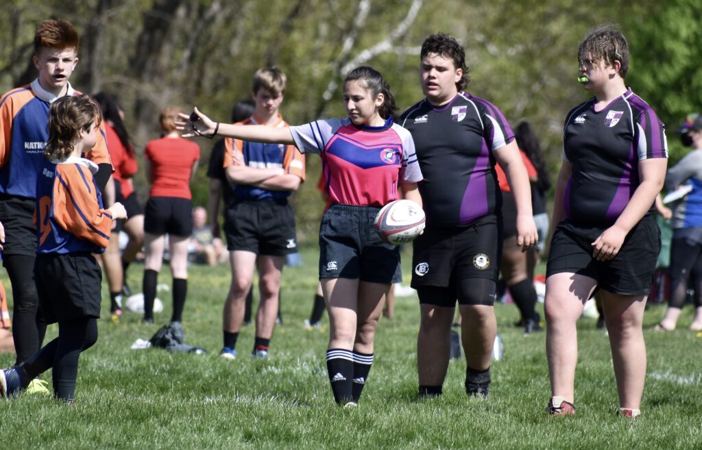 Coco Nate refereeing a rugby game